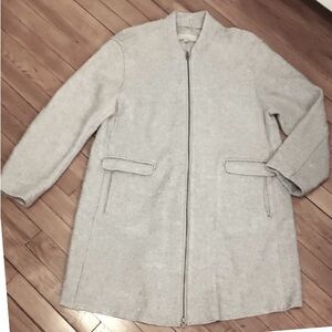 Woman Within Light Gray Jacket!